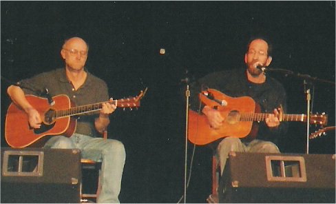 Jim Truman and Chris Haddox playing guitars